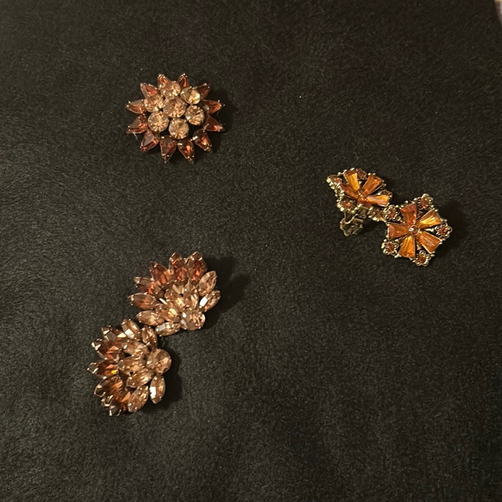 Two pack of vintage clip on earrings with matching brooch